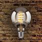 Лампа светодиодная филаментная Elektrostandard E27 8W 3300K золотистая 4690389125232 - фото №2