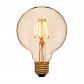 Лампа светодиодная филаментная E27 4W 2200K золотая 056-779a - фото №1